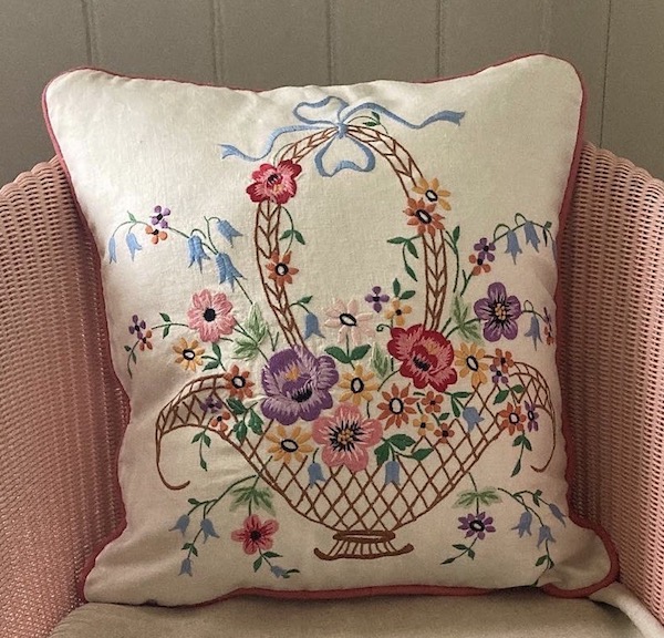 Vintage floral embroidered cushion