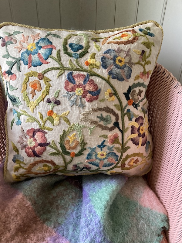 antique crewel cushion